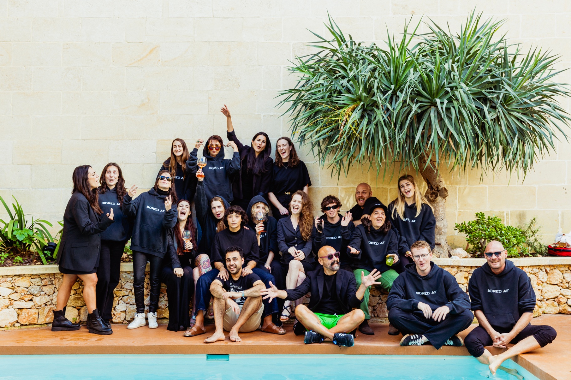 The Von Peach team gathered together, smiling in their Bored AF hoodies.